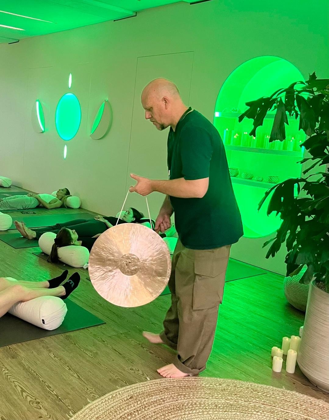 Ian Snowball playing a gong
